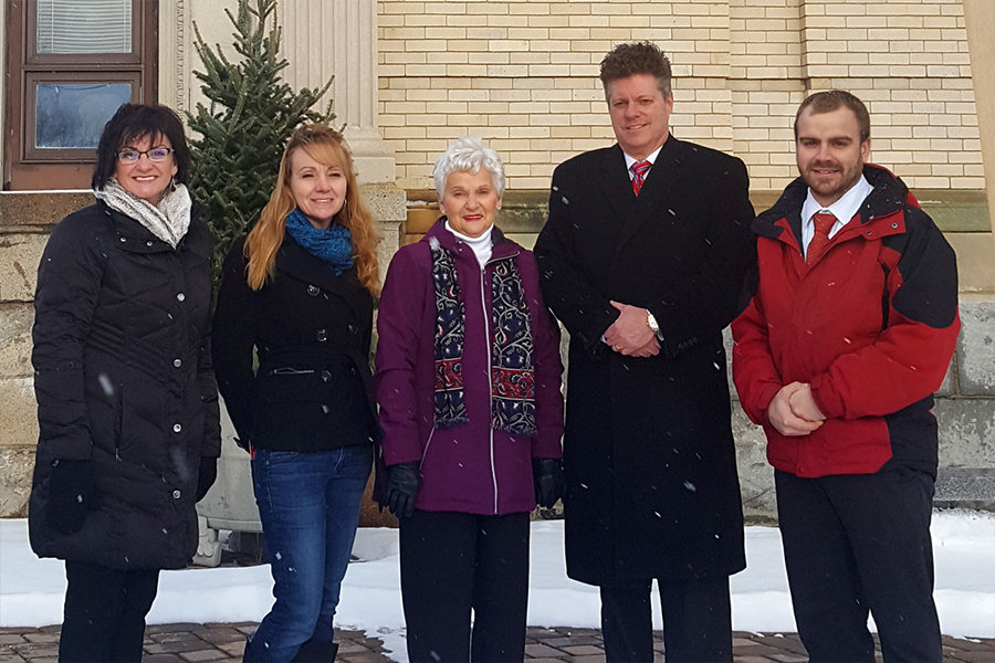 From left: Nicole Plourde, Catholic Charities NH’s deputy director of Parish & Community Services and community outreach coordinator at its Berlin district office; Holiday Center Director Tammy St. Amant; Holiday Center board member Yvette Hachez; Catholic Charities NH President and CEO Thomas Blonski; and Jeffrey Lacroix, administrator of St. Vincent de Paul Rehabilitation and Nursing Center in Berlin.