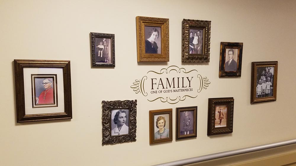 one of the family photo walls at mt. carmel