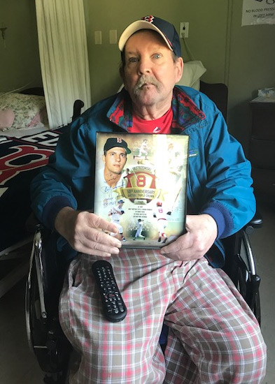 St. Teresa resident Jack with a signed photo of Red Sox player Carl Yastrzemski.