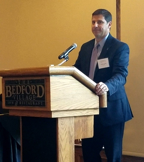 Outgoing Catholic Charities New Hampshire board member Todd Fahey speaks at the organization's 2018 Annual Meeting. Fahey was the recipient of the 'Above and Beyond' award. Fahey is state director for AARP New Hampshire.