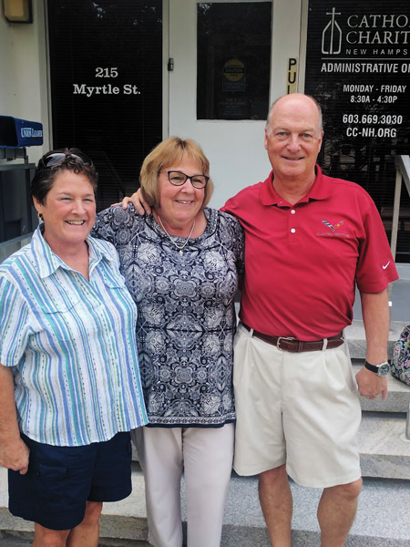 Reunited siblings Joan and Skip with Catholic Charities NH's Elaine Langton.